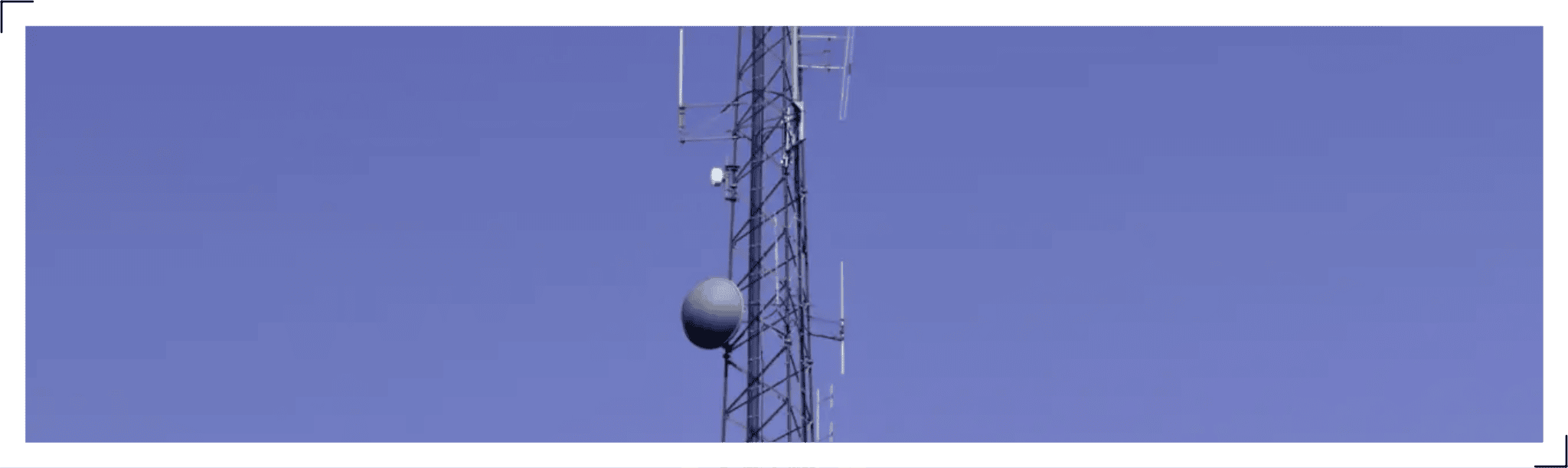 Cell tower with antennas and communication equipment in Annapolis, MD.